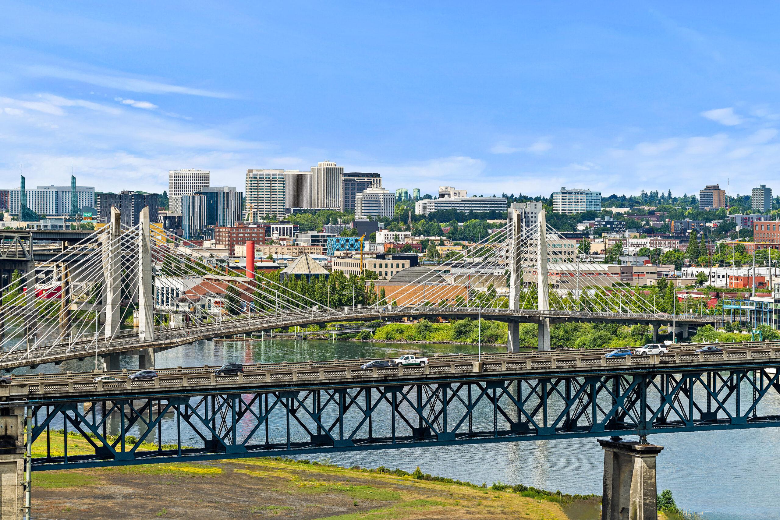 A photo of bridges over the Willamette river and the Portland skyline.